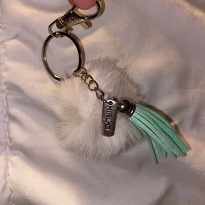 Handmade white miracle keychain